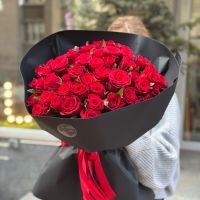 Bouquet 51 red roses in black wrapping