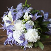 statice, clematis, calla, carnation, vanda orchid, trachelium (3 pcs.), freesia, packaging, ribbon