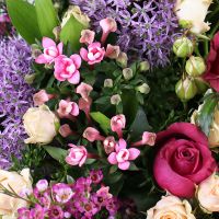 allium, premium pink rose, lilac lathyrus, chamelacium, cream spray rose, aspidistra, packaging, ribbon