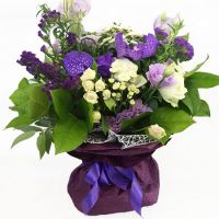 orchid, limonium, local white rose, white Stallion chrysanthemum, violet eustoma (2 pcs.), white spray rose, packaging, ribbon